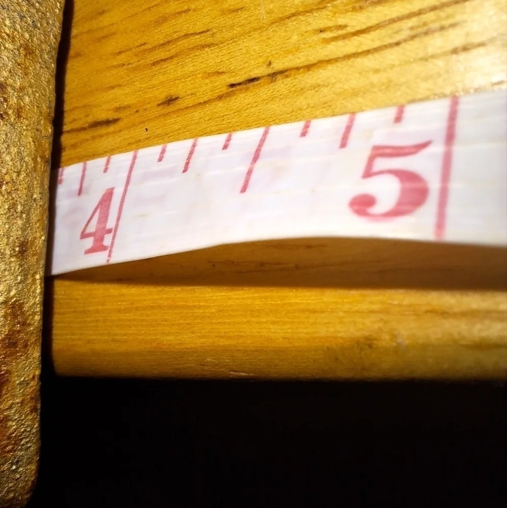 An unbranded Mouse and sleigh stocking holder. The base is 3.75